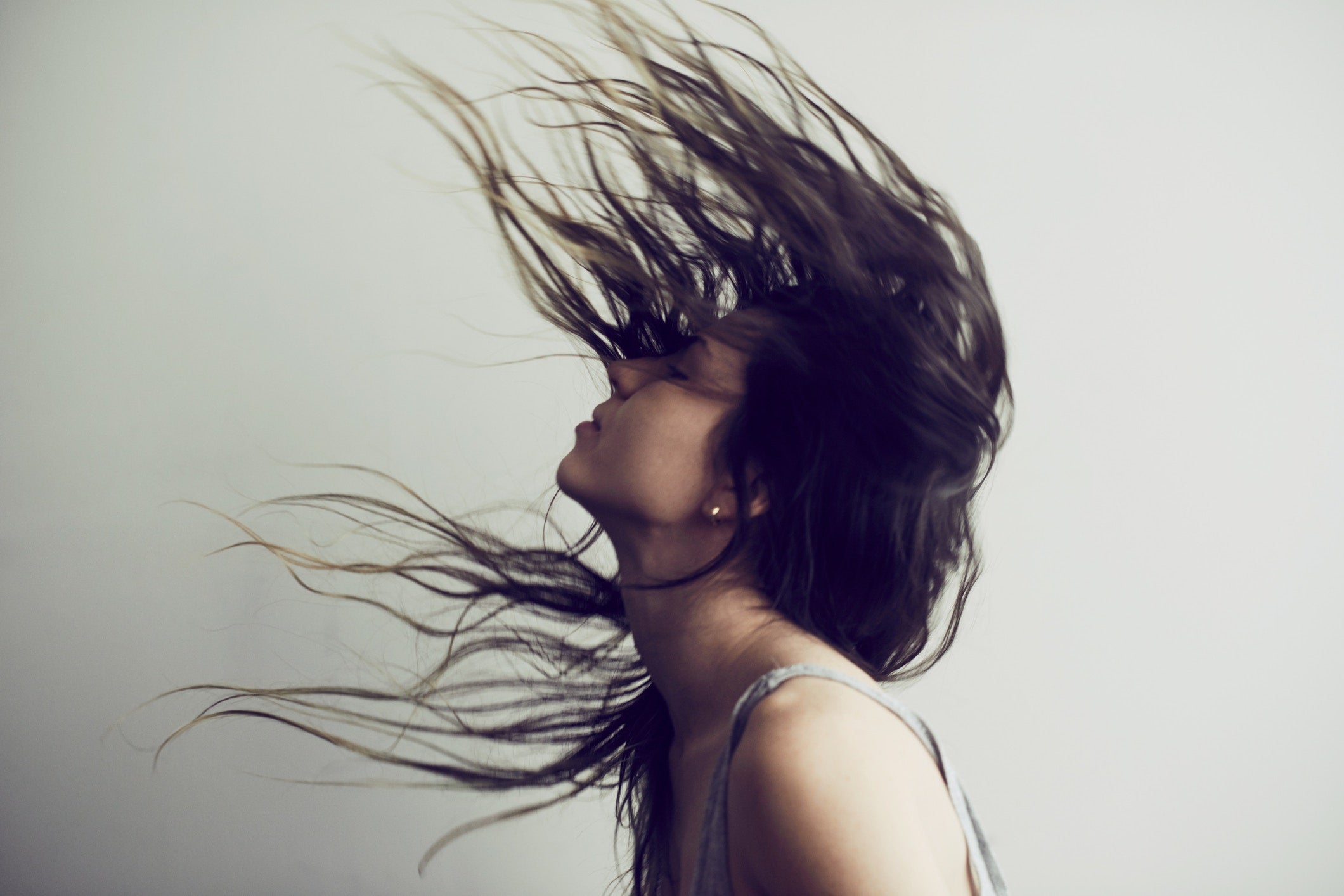 Woman With Hair Flying In The Air