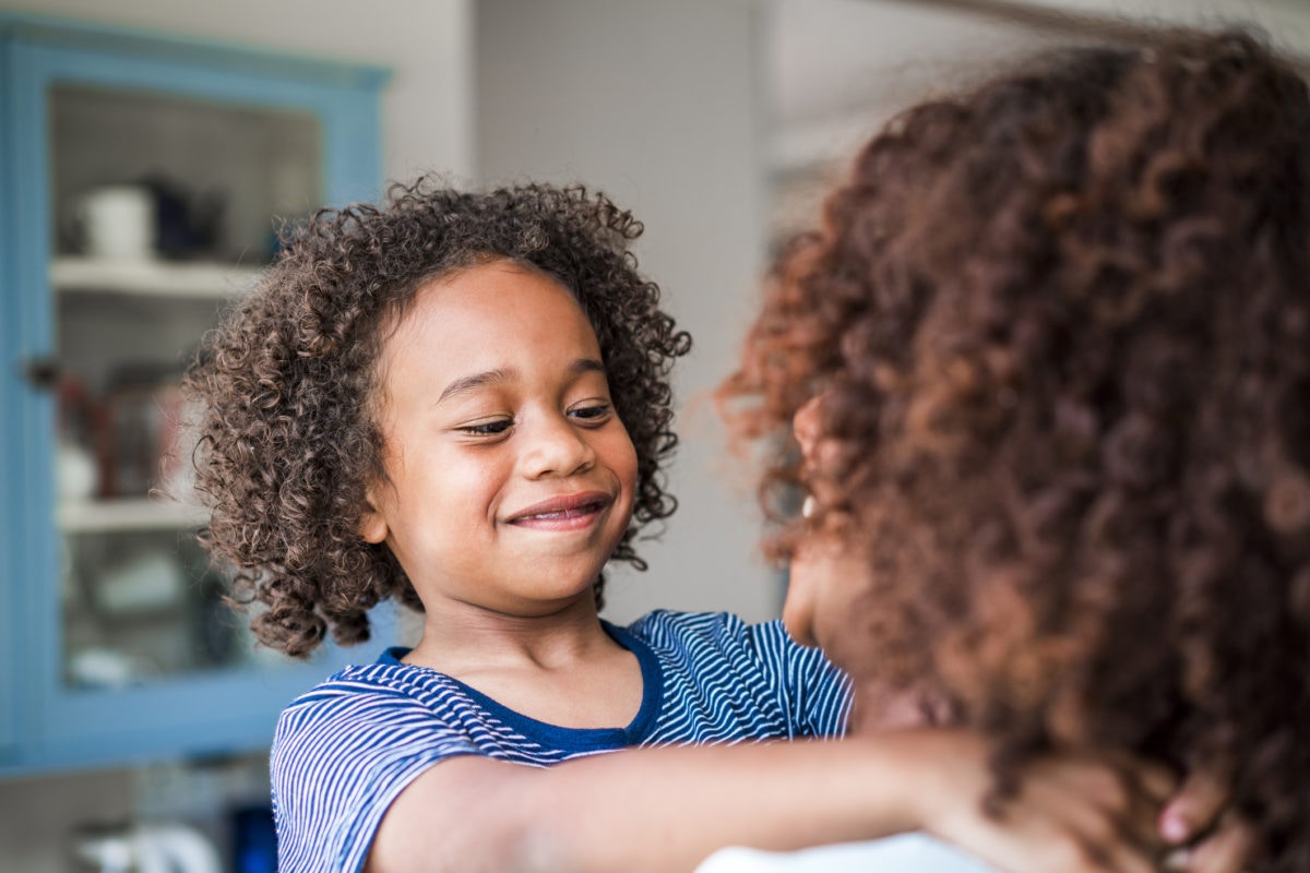 Young kid Looking to mom Face to Face
