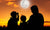 family looking at the moon