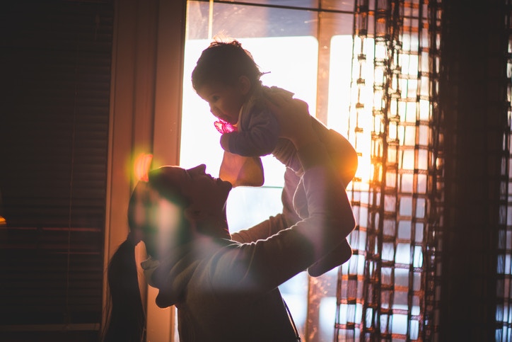 a mother playing with child