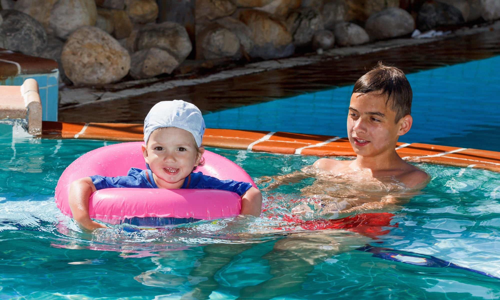 Two children in a pool