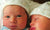 newborn twins wearing tricot hats