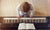 Young girl playing piano