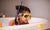 kid on a tub with breathing tube and swim googles