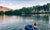 A boy on a lake in a ring floating