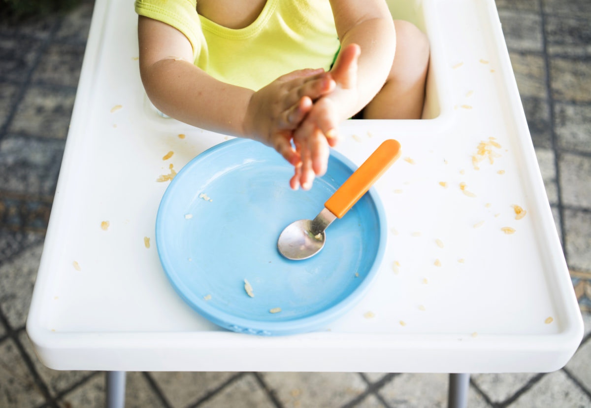 Child finished meal, baby plate