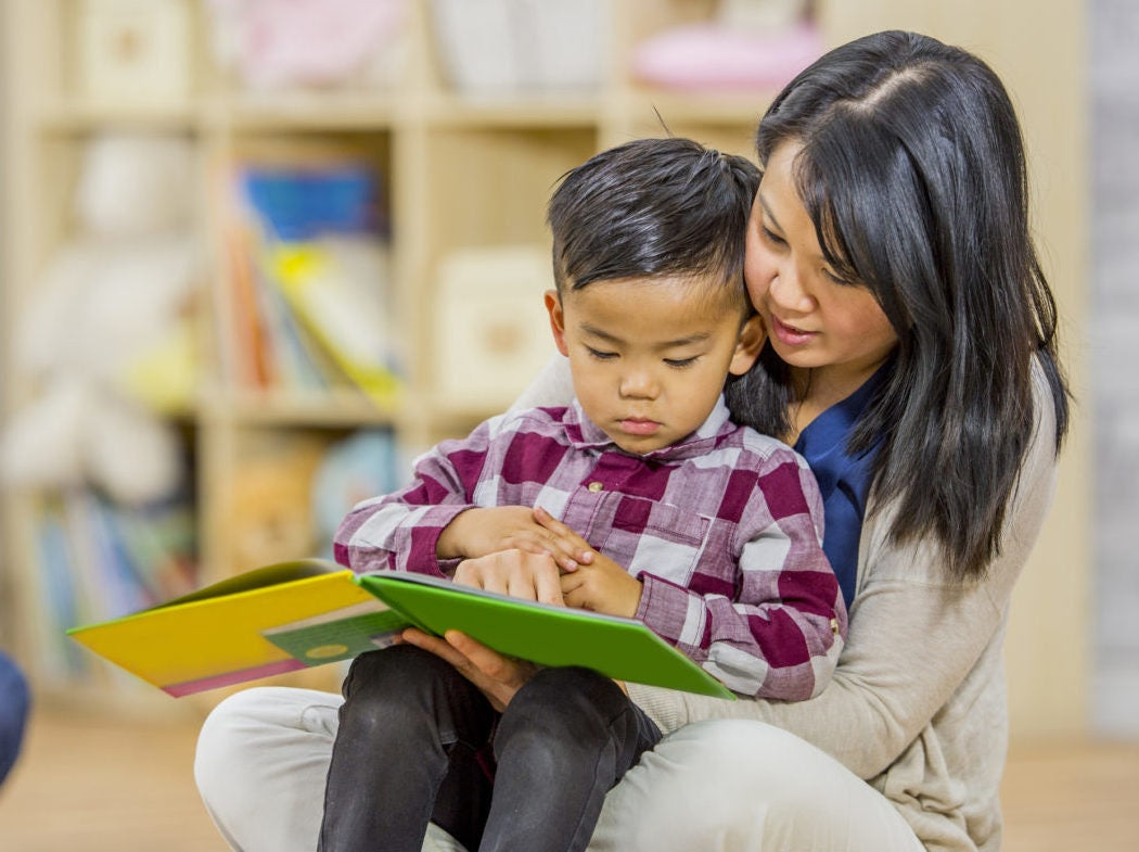 Mother is teaching to her son