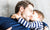 Little boy kissing his father