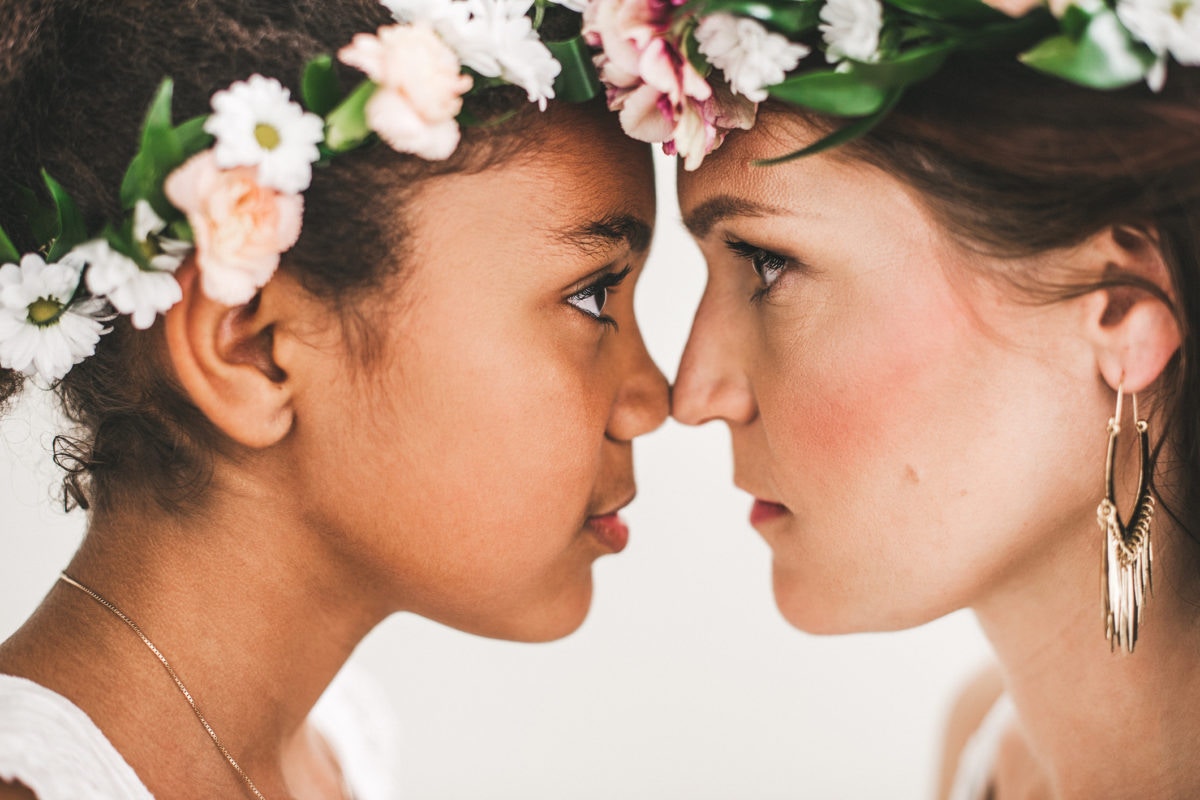 mother and daughter touching noses