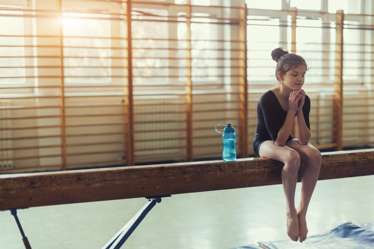 A girl preparing for some athletic activity