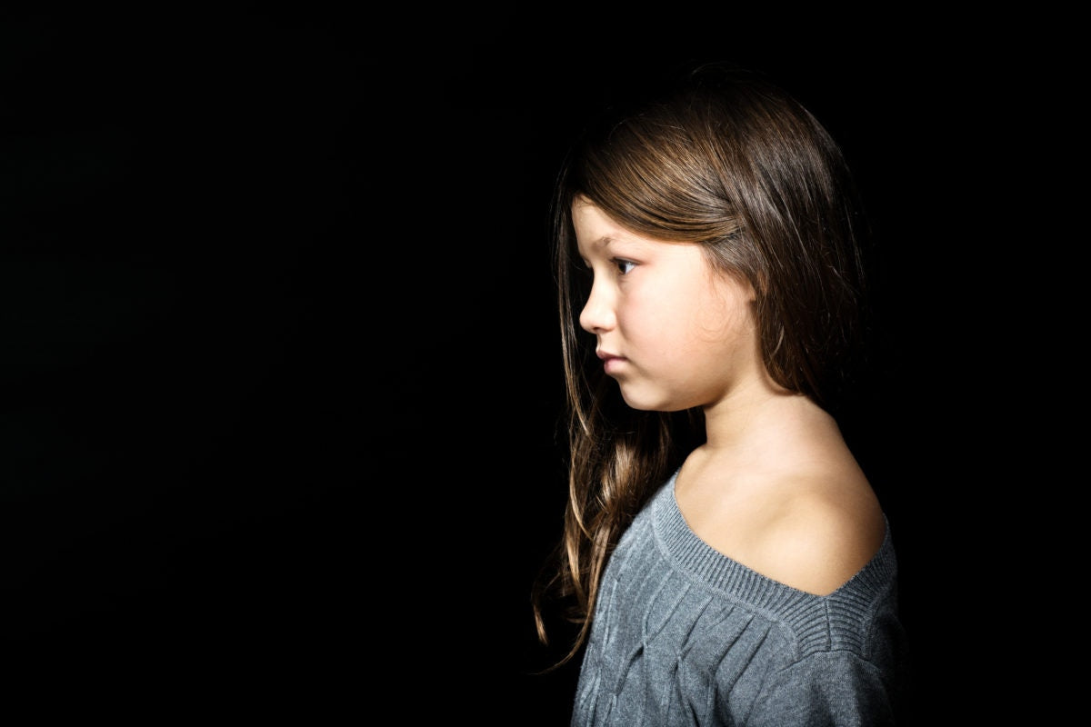 young girl looking into the distance