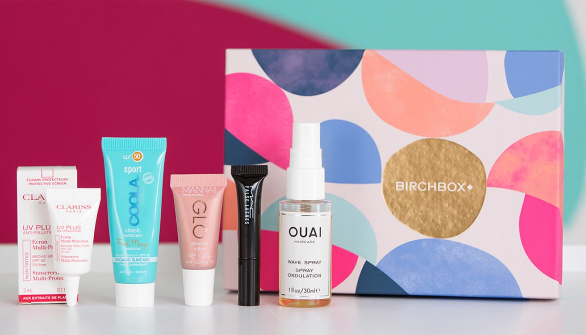 birchbox with makeup products next to it