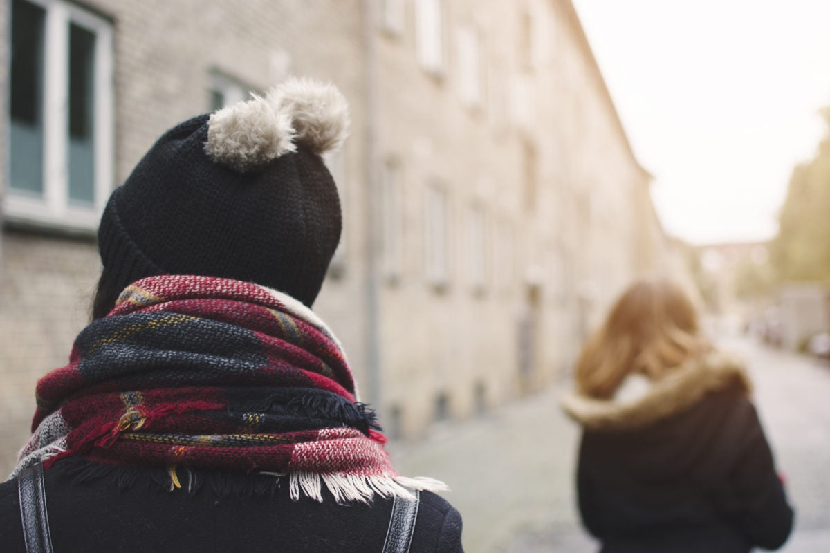 Person standing by wearing wollen cap