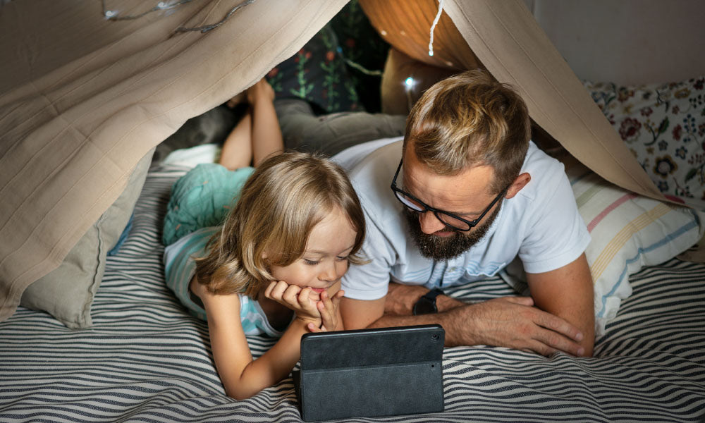 father and daughter in a tent