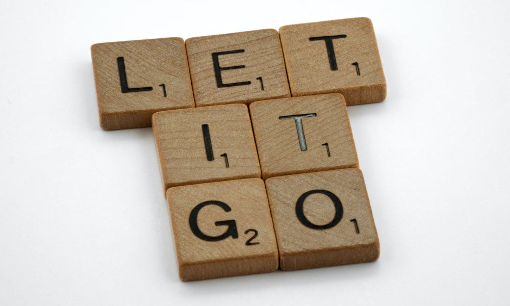 let is go written in wooden blocks