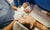 newborn baby on woman's chest 